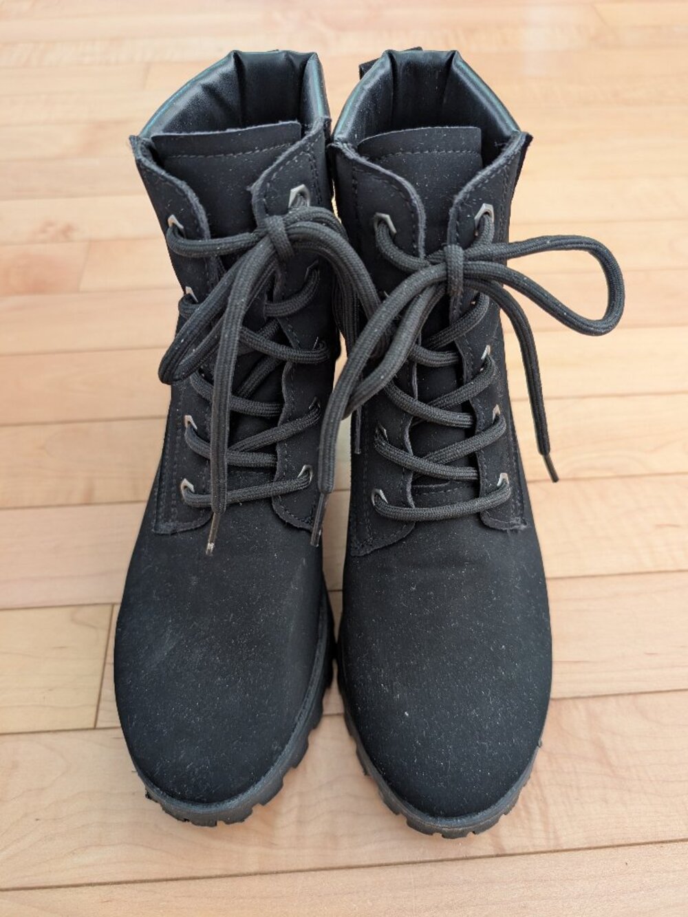 Black suede ankle boots with chunky heel and lace up design.  Size 7.5